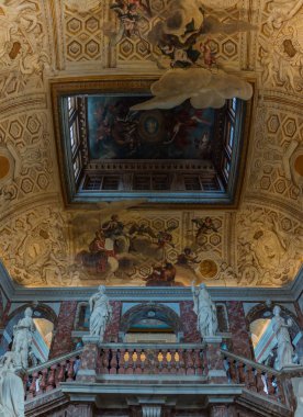 A picture of the ceiling and statues in Drottningholm Palace. clipart