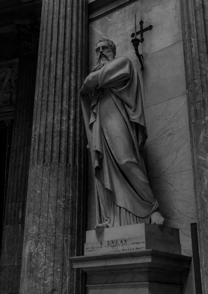 A black and white picture of one of the statues inside the Church of San Francesco di Paola (Naples).