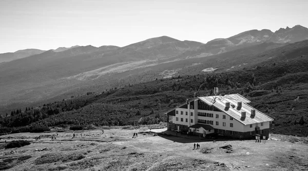 A black and white picture of the visitor center / hut at the top of one of the ski lifts in the Rila National Park.