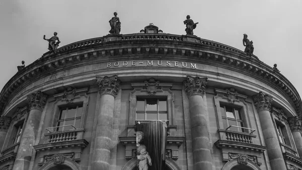 A black and white picture of the main facade of the Bode Museum, in Berlin.