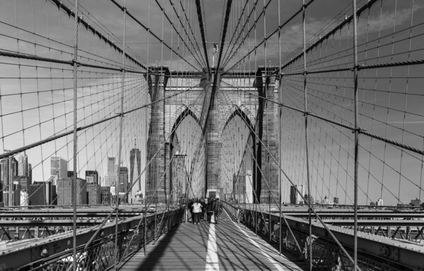 A black and white picture of the Brookyn Bridge.