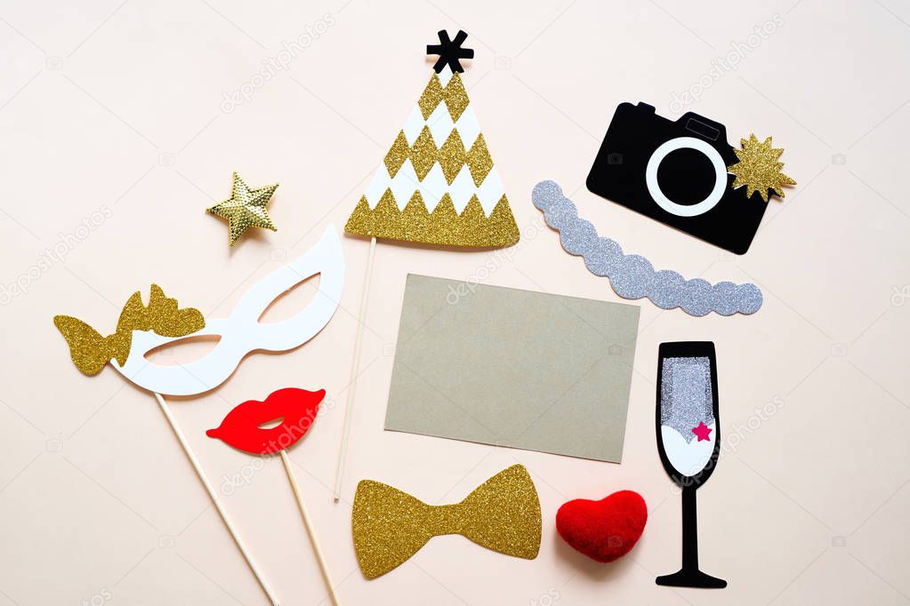 Cute party props and blank card on colorful background, happy new year party celebration and holiday concept