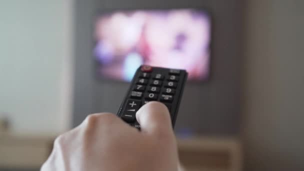 Male Hand Using Remote Control Putting Buttons Close View — Stock Video