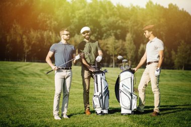 friends spending time on golf course clipart