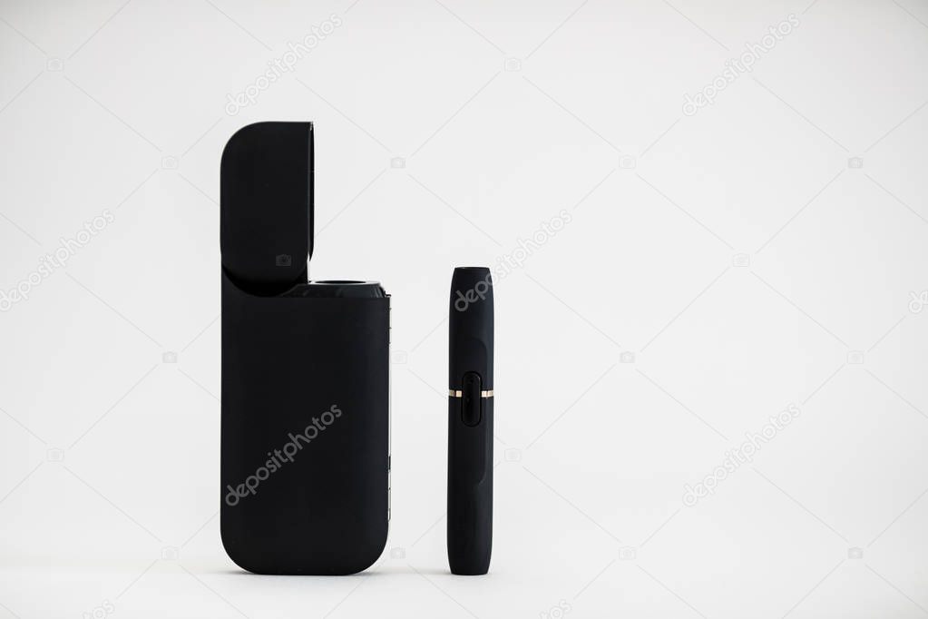 New technology of electronic cigarettes system. Electronic cigarettes, technology cigarette, electronic cigarette. Tobacco system IQOS.