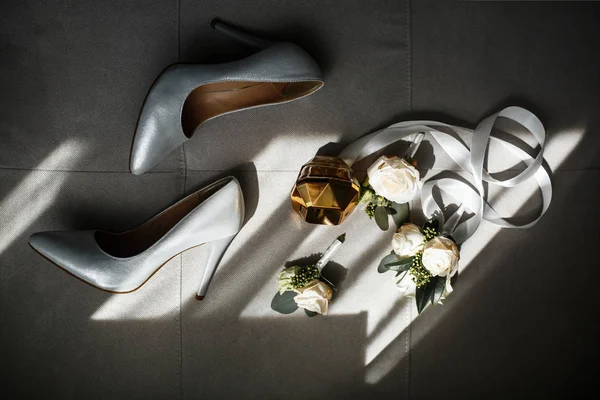Wedding accessories for beautiful bride. Bridal shoes. Bride morning.