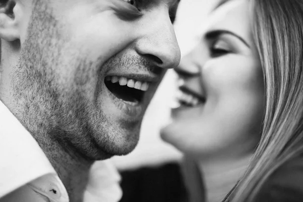 Happy couple in love hugging and kissing on the street old town. — Stock Photo, Image