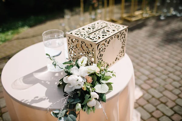 Beautiful flower decorations outside. Wedding ceremony outdoors.
