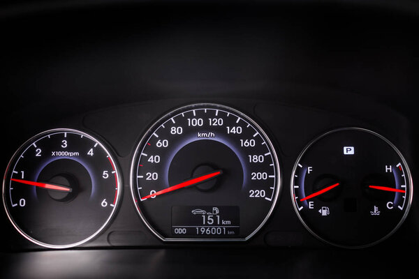 Speedometer and steering wheel. Luxury car interior details. 