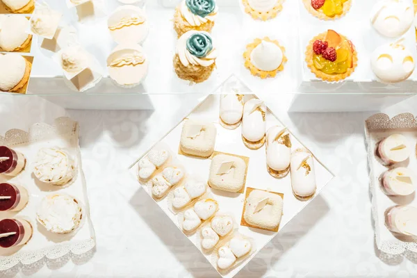 Parti için farklı tatlılar tablo. Şeker çubuğu. 