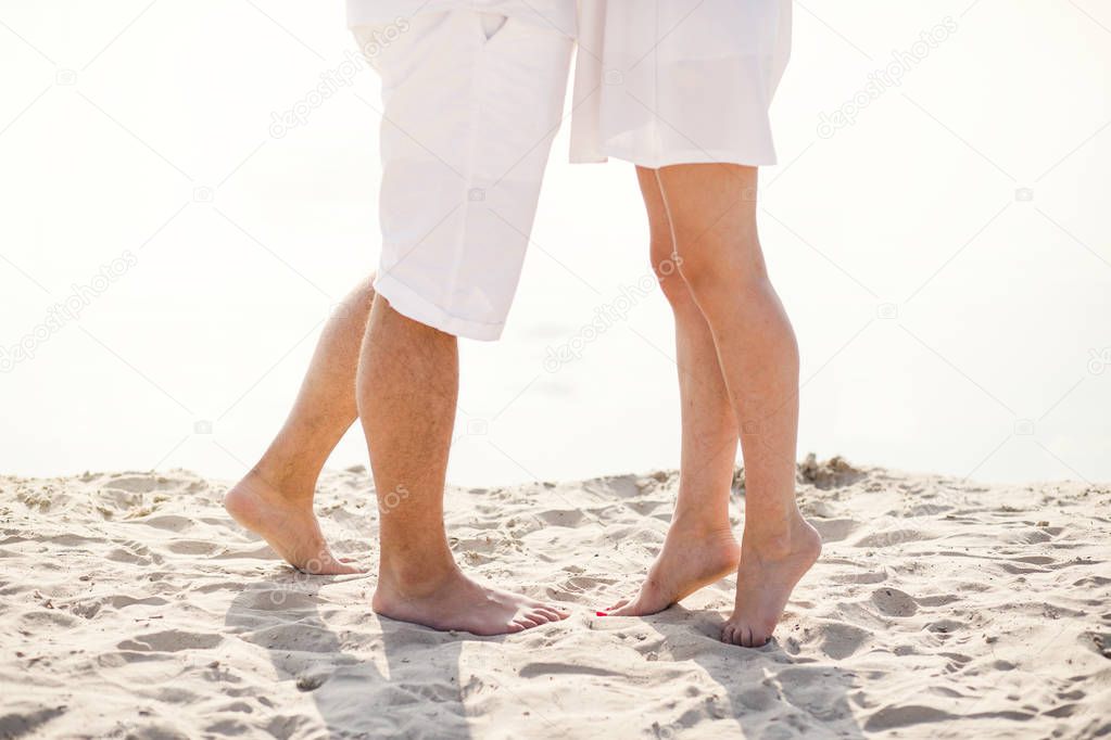 Sunny summer day. Happy couple at the beach