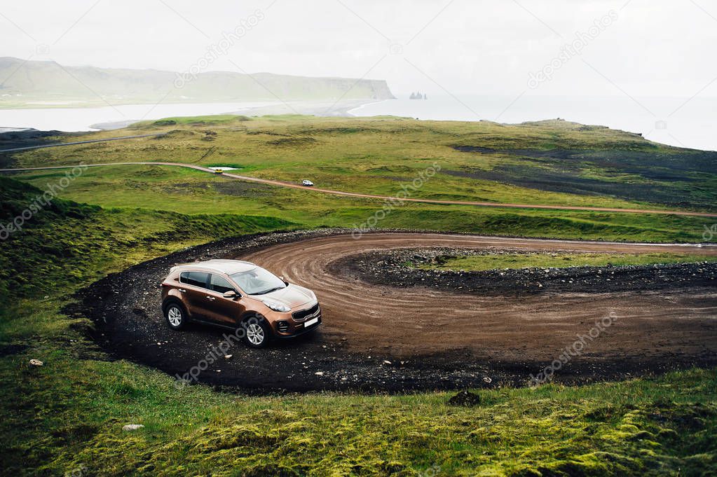 SUV car. Travel concept with big 4x4 sport and modern car in mountains. Iceland. Beautiful landscape in Iceland.