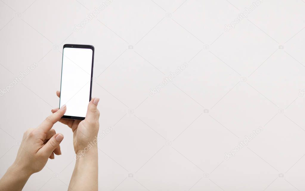 Close up hand Using a Smart Phone.