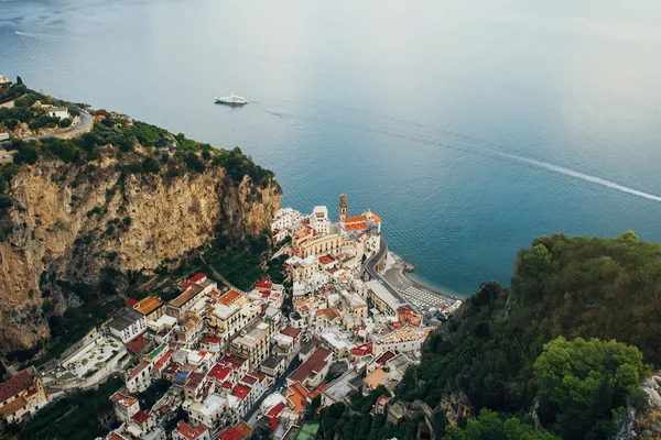 beautiful green island with sea and houses