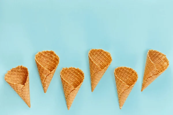 Ice Cream Waffle Cones Blue Background Minimal Composition Top View — Stock Photo, Image