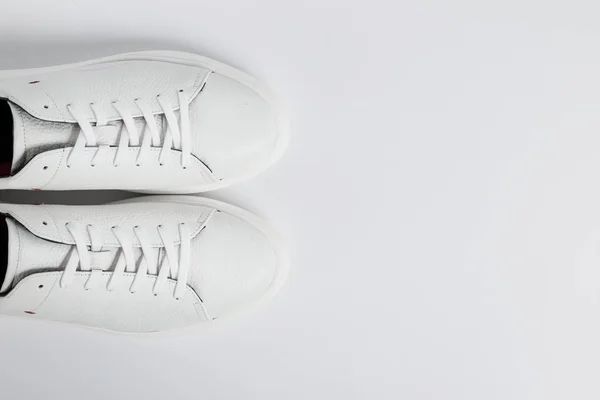 Mens sport shoes, close up. New white sneakers — Stock Photo, Image