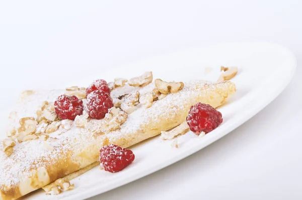 pancakes (crepes) with raspberries - healthy breakfas