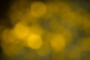 Bokeh soyut dokusu. Renkli. Odaklanmamış arka plan. Bulanık parlak ışık. Dairesel noktalar.