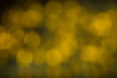 Bokeh soyut dokusu. Renkli. Odaklanmamış arka plan. Bulanık parlak ışık. Dairesel noktalar.