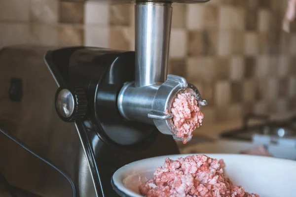 meat is ground in a meat grinder