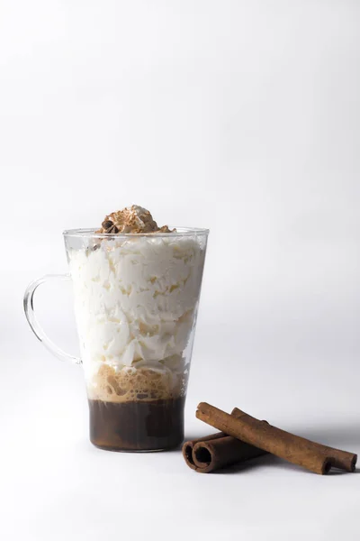 Irish coffee  with cinnamon.cold fresh ice coffee with cinnamon in white background