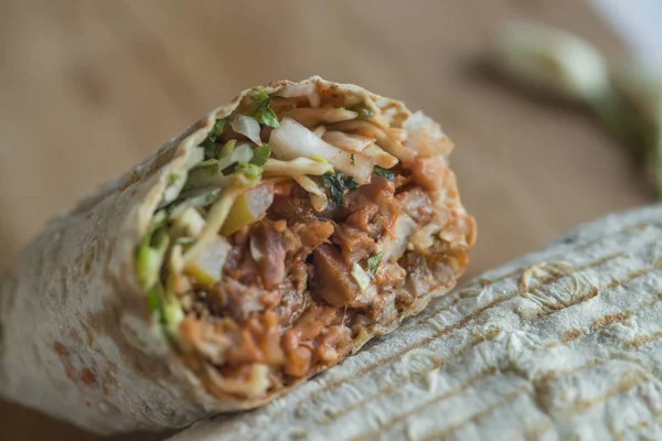 Shawarma sandwich,doner kebab,gyro on a wooden table — Stock Photo, Image