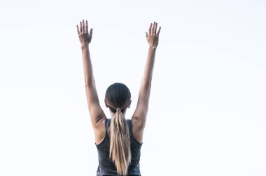 Kadın jimnastik yapıyor. Arkadan görüntülemek