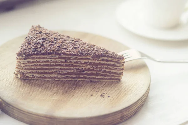 Mikado cake on wooden board — Stock Photo, Image