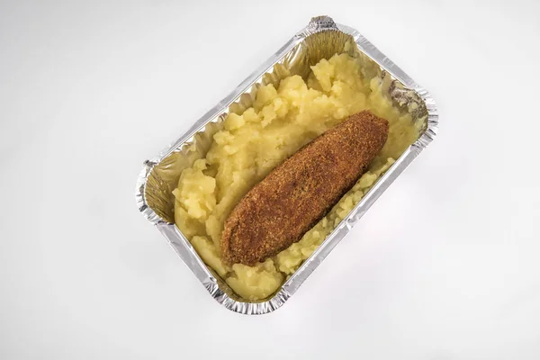 mashed potatoes and chicken cutlet in a food storage container