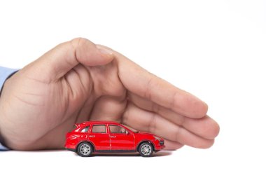 Time-worn car.Car (automobile) insurance and collision damage waiver concepts. Businessman with protective gesture clipart