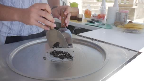 Cooking Natural Fruit Ice Cream In Thai Style Making Making Ice Cream Rolls With Passion Fruit On Cold Plate Close Up Stock Footage