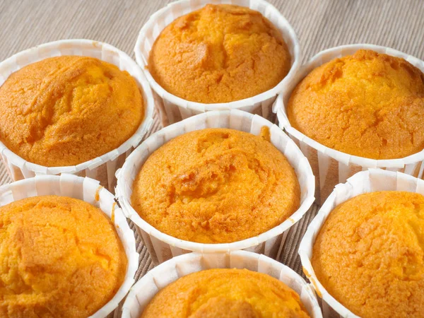 Vanilla muffins, paper cupcake holder, selective focus. Close-up photo of decorated homemade cupcakes in box. Gluten free almond flour muffin.