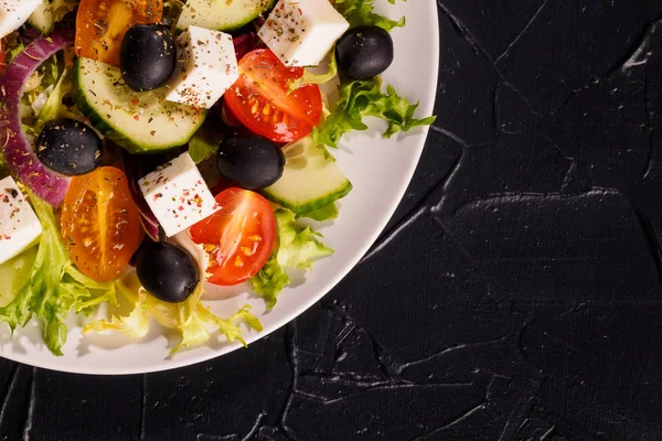 Greek Salad Fresh Vegetables Feta Cheese Black Olives Dark Stone — Stock Photo, Image