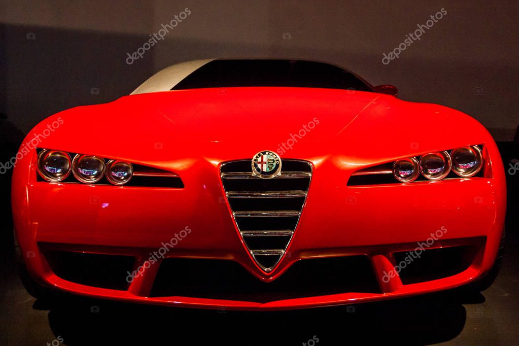 CHELYABINSK, RUSSIA - 20 July 2018: Alfa Romeo logo on the front of a red new luxury sports car. one of the most beautiful and expensive cars in the world.