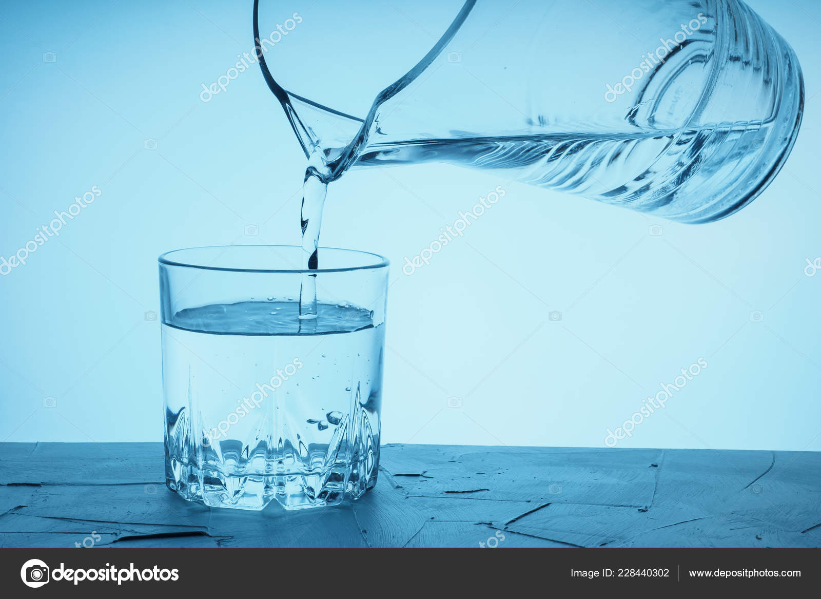 Pour Water Pitcher Glass Drinking Water Poured Jug Glass Blue Stock Photo  by ©Evgeniy_Bobkov 228440302