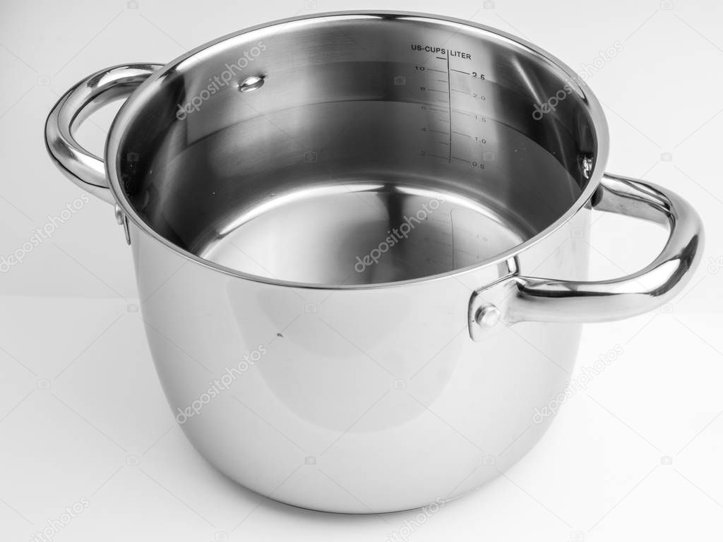 Stainless steel cooking pot without cover with water, measure the water level - 2,5 liters. Isolated on white background.