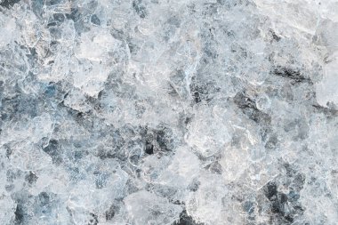 Colorful ice. Abstract Arctic ice texture. Frostwork. Decorative ice crystals. Winter Nature background. The frozen water. clipart