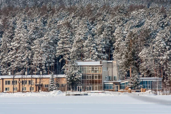 recreation center on the shores of the purest mountain lake. hotel in the wild in the fresh air. rest and recovery in a luxury pension. winter tourism and rest in a sanatorium.