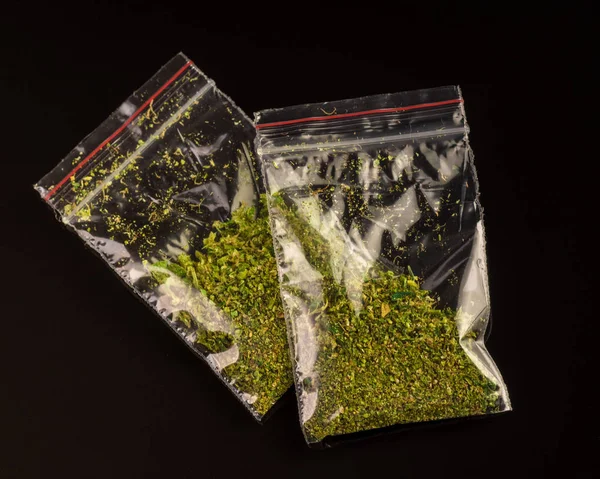 Bags of marijuana on a black background. — Stock Photo, Image