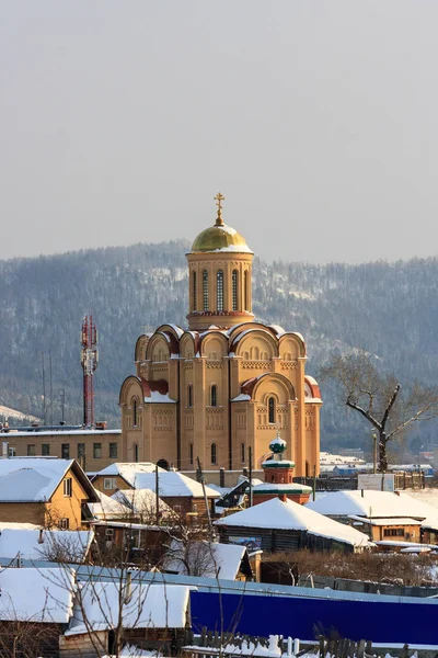 Orthodox church in the city of Miass. mountain landscape in wint