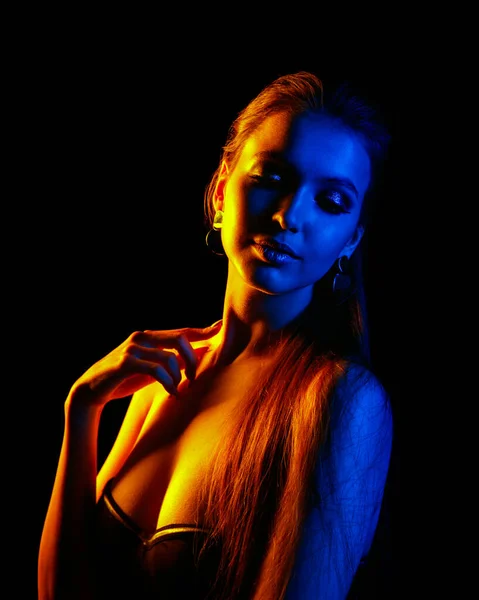 Beautiful sexy woman in colorful design and glitter vivid neon l — Stock Photo, Image