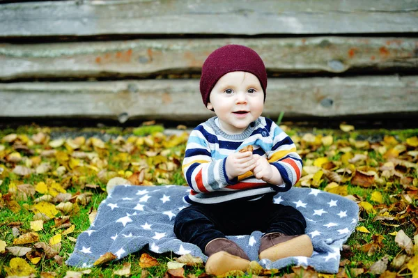 Cute newborn baby in warm wool knitted hat and sweater Royalty Free Stock Photos