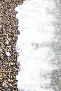 Beach taş arka plan ile deniz