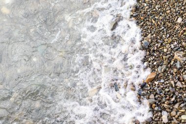 Beach taş arka plan ile deniz