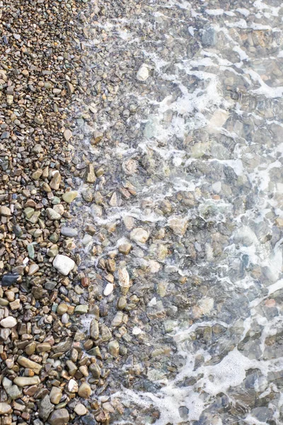 Beach taş arka plan ile deniz