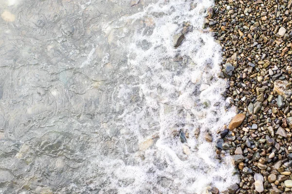 Beach taş arka plan ile deniz