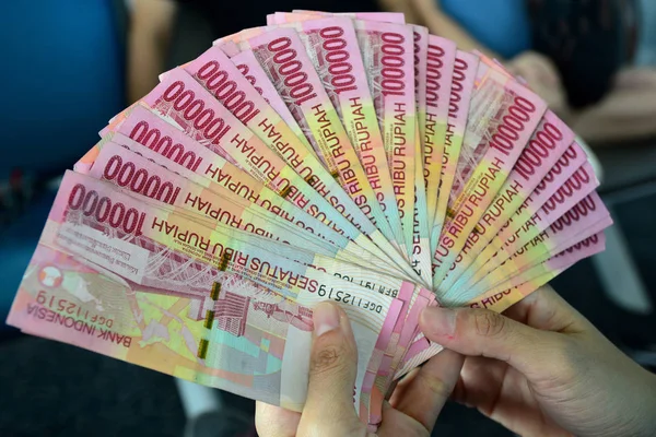 Hand Holding Rupiah Indonesian Money — Stock Photo, Image