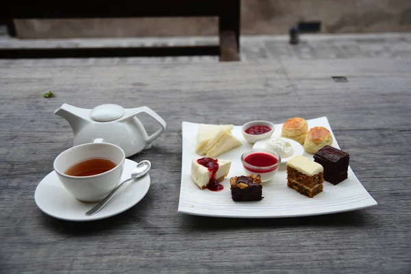 Traditional afternoon tea set on wooden table — Stock Photo, Image