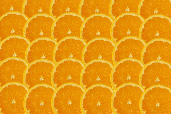 Tło przyrodnicze z owoców cytrusowych-owoc pomarańczy plasterki, streszczenie b — Zdjęcie stockowe