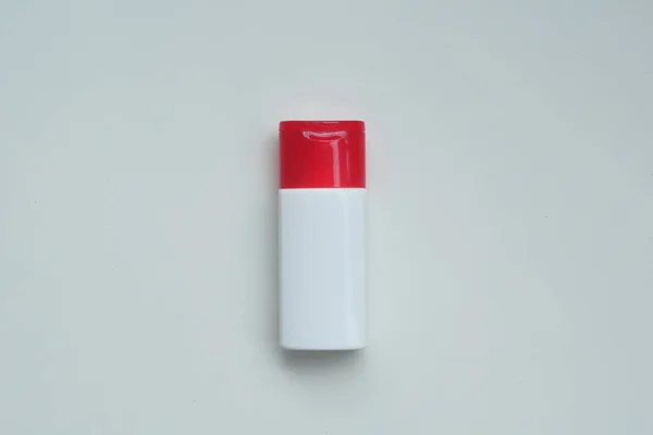 Cosmetic plastic bottle for lotion, cream, shampoo, bath foam is — Stock Photo, Image